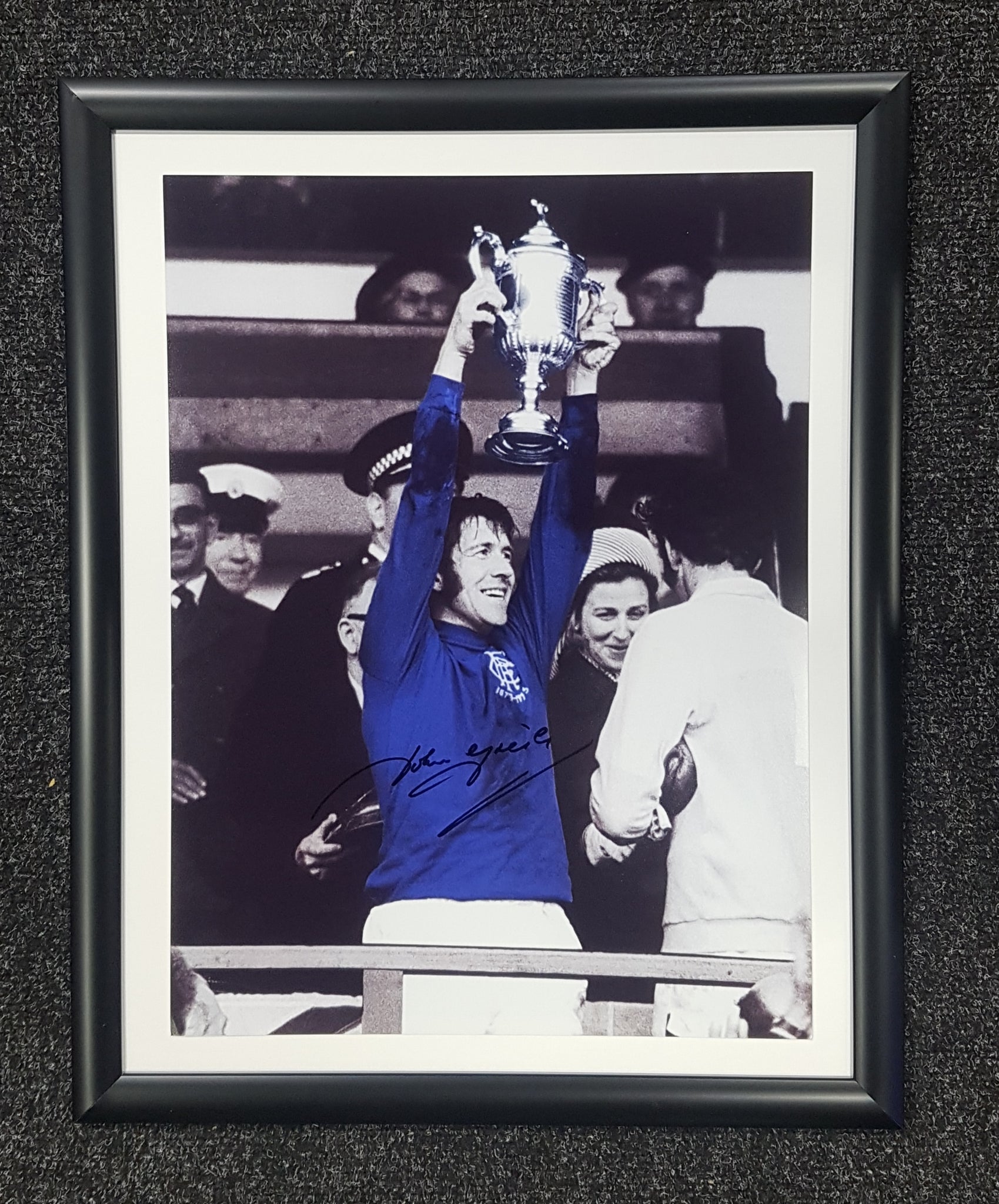 John Greig .